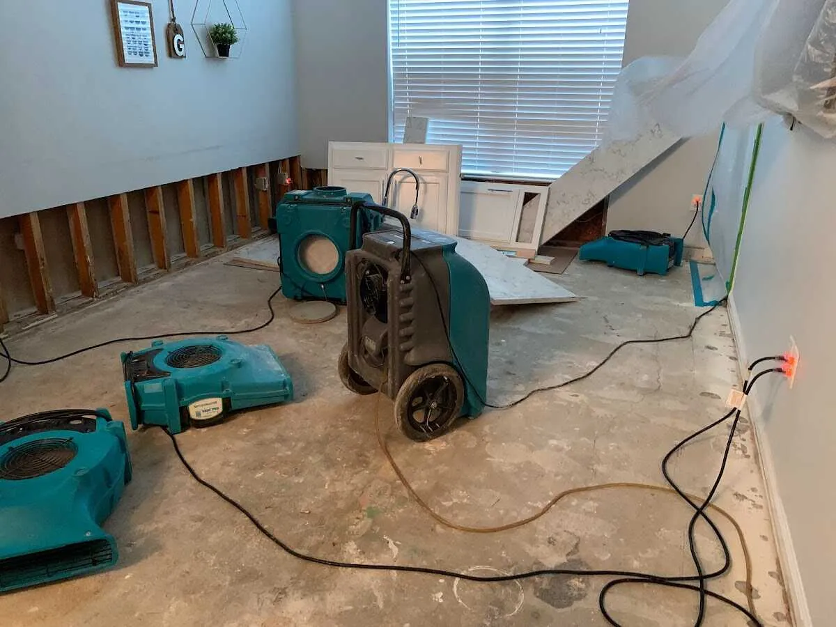 Dehumidifier in flood-cut room for Water Damage Restoration in Wauwatosa